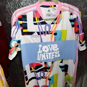 - [ ] Small adidas multi color love unites shirt $30 brand new